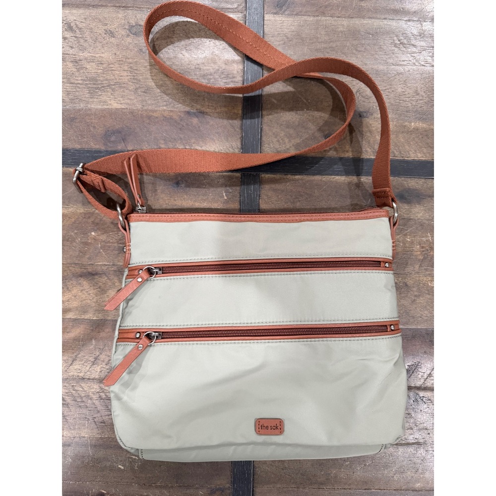 The Sak Iris Crossbody Bag Sage Green Nylon Multi Pocket Adjustable Strap